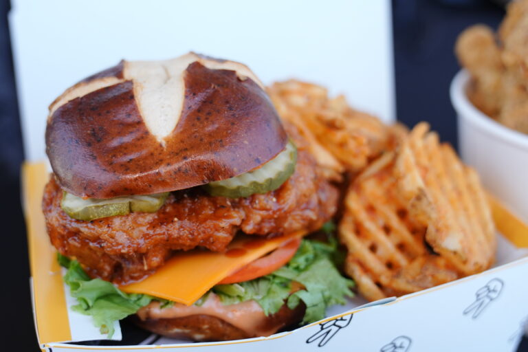 Vegan chicken sandwich and waffle fries from A Peace of Soul Food Truck.