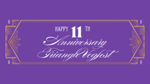 Purple banner reading ‘Happy 11th Anniversary Triangle Vegfest’ with decorative gold accents.